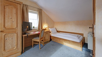 Dreibettzimmer mit zusätzlichem Einzelbett